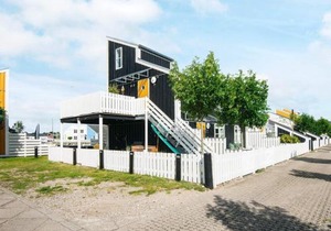 6 person holiday home on a holiday park in Ebeltoft