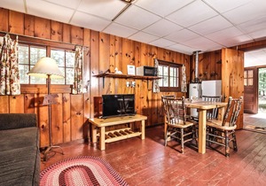 Adorable cottage in lakeside resort with beach and personal dock!