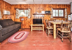 Adorable cottage in lakeside resort with beach and personal dock!