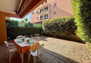 Beachside 2-Room Apartment with Private Garden, Terrace, and Parking