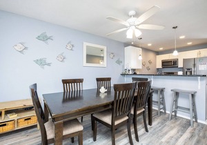 Beachside Condo Steps from the Sand with Pool, Hot Tub, and Private Balconies