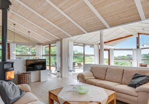 Beautiful, bright cottage with large wooden terrace and sea view.