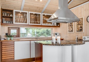 Beautiful, bright cottage with large wooden terrace and sea view.