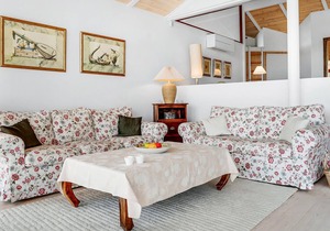 Beautiful, bright cottage with large wooden terrace and sea view.