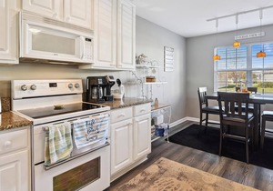 Beautifully decorated 1st floor unit nestled within unspoiled land and gently lapping inland waterways -