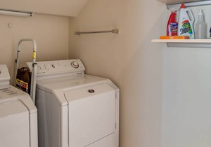 Bright townhouse-style condo with pools, hot tub, & sandy beach access