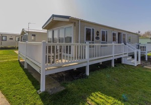 Caravan with decking at Broadland Sands in Suffolk ref 20294BS