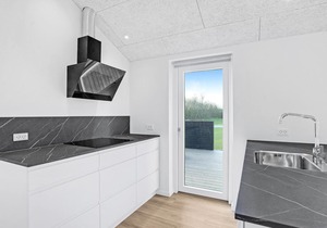 Chic vacation home on the secluded coast of East Jutland.
