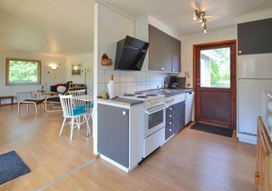 Classic, Danish cottage near the water.