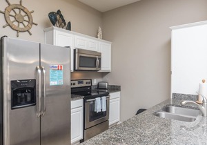 Coastal Vibe Retreat with Two Heated Pools, Steps from the Beach