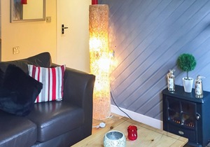 Comfortable semi-detached lodge with one double and one twin.