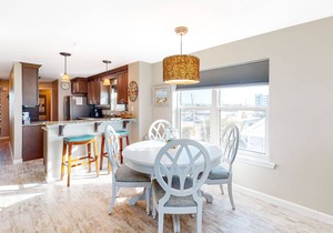 Condo with sweeping panoramic views of the Gulf, two beach chairs & umbrella