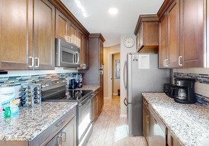 Condo with sweeping panoramic views of the Gulf, two beach chairs & umbrella