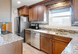 Condo with sweeping panoramic views of the Gulf, two beach chairs & umbrella