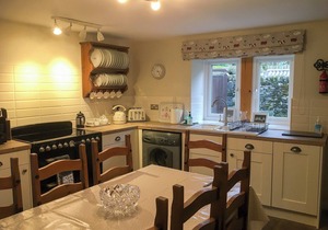 Detached barn conversion with side terrace overlooking the river.