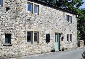 Detached barn conversion with side terrace overlooking the river.