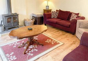 Detached barn conversion with side terrace overlooking the river.