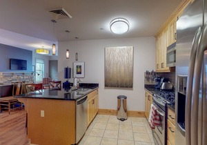 Downtown lakefront luxury condo w/patio & shared hot tub/pool