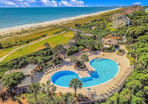 Elegant ocean-view townhome with beach access & pool - perfect location