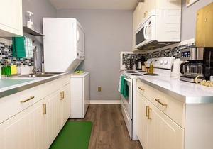 Emerald Oasis: Tremont 4BR Duplex by Christmas Story House | Patio, Laundry, Parking 7 Min Downtown