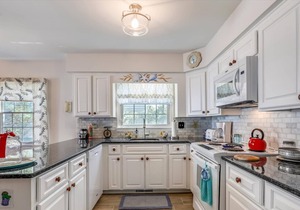 FREE ACTIVITIES!!! Super location just steps from the beautiful beaches of South Bethany with all the cottage charm imaginable featuring hardwood floors, 4 bedrooms, 3.5 baths