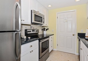 Free Golf at Bear Trap Dunes and MORE! 2 Bedroom 2 bath. first floor Sea Colony West unit with a beautiful view of the lake.
