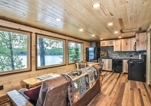 Gorgeous remodeled lakeside cabin with a fireplace, and direct access to the sno