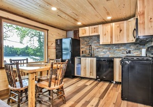 Gorgeous remodeled lakeside cabin with a fireplace, and direct access to the sno