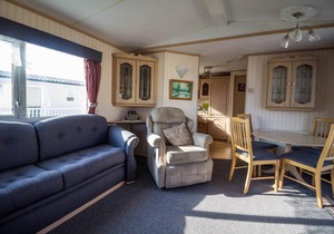 Great 6 berth caravan for hire with decking by the beach in Suffolk ref 40096ND