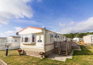 Great 6 berth caravan for hire with decking by the beach in Suffolk ref 40096ND