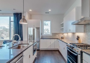 Gulch modern 3 story condo, 2 car garage, rooftop fire pit, security, and view!
