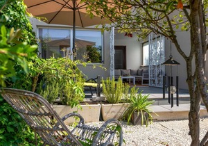 Holiday home with garden and barbecue