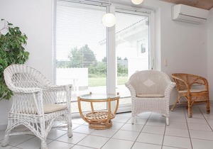 In a quiet vacation area near Lønstrup, this stone vacation home awaits you on a natural plot with p