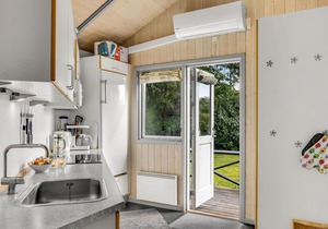 In the naturally beautiful area of Udsholt Strand lies this beautiful luxury holiday home.