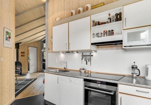In the naturally beautiful area of Udsholt Strand lies this beautiful luxury holiday home.