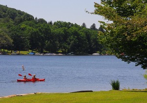 Lakefront townhome with lake views & heated indoor community pool!