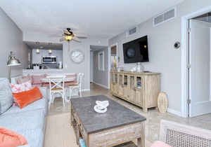 LaPlaya 202E-Catch the gentle Gulf breezes on your private balcony beneath the swaying palms.