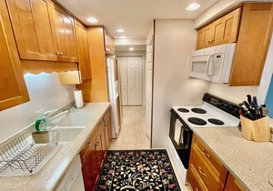 LINENS INCLUDED*! Cool colors with a beautifully remodeled kitchen and baths greet you in this 1050 sq ft unit with ocean views from every room.