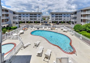 Lovely 2 Bedroom 2 Bathroom Ocean Block Condo with Outdoor Pool on 55th Street!