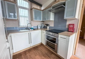 Lovely 6 berth caravan with decking at California Cliffs in Scratby ref 50048L