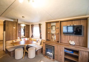 Lovely caravan for hire with decking at Skipsea Sands Holiday Park ref 41161WF