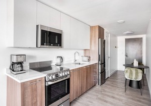 Lovely Central Square Studio w/Gym, W/D & Roof, near T, by Blueground