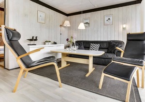 Lovingly furnished cottage on well-kept grounds with lawn and space for ball games.