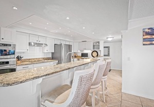 Luxury direct oceanfront 3/3 corner penthouse with heated pool and garage parking