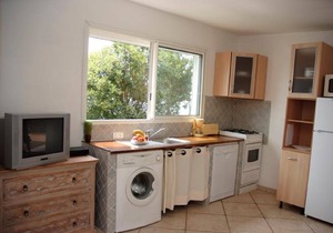 Mini villa 2 people, ground floor, feet in the water direct access to the beach