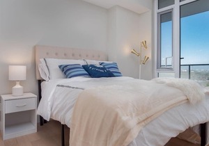 Modern 2 BR Near Stampede Rooftop Patio Gym