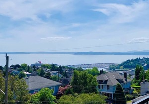 Modern, airy and bright, this private apartment sits on the top of Queen Anne hill.