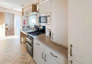 Modern and contemporary 12ft-wide caravan with two twin.