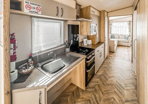 Modern and contemporary 12ft-wide caravan with two twin.