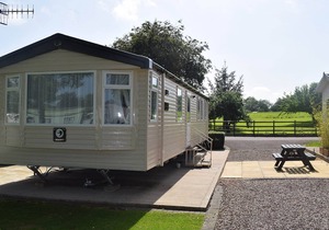 Modern and comfortable 2-bedroom caravan with one double and one twin.